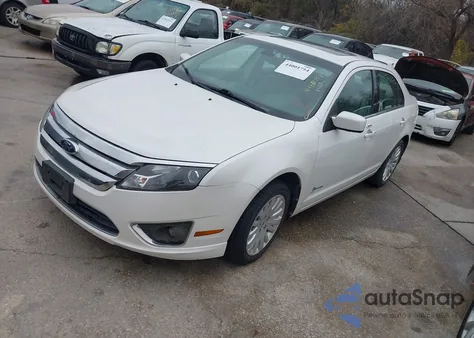 2012 Ford Fusion Hybrid from USA, damaged, VIN 3FADP0L31CR238159